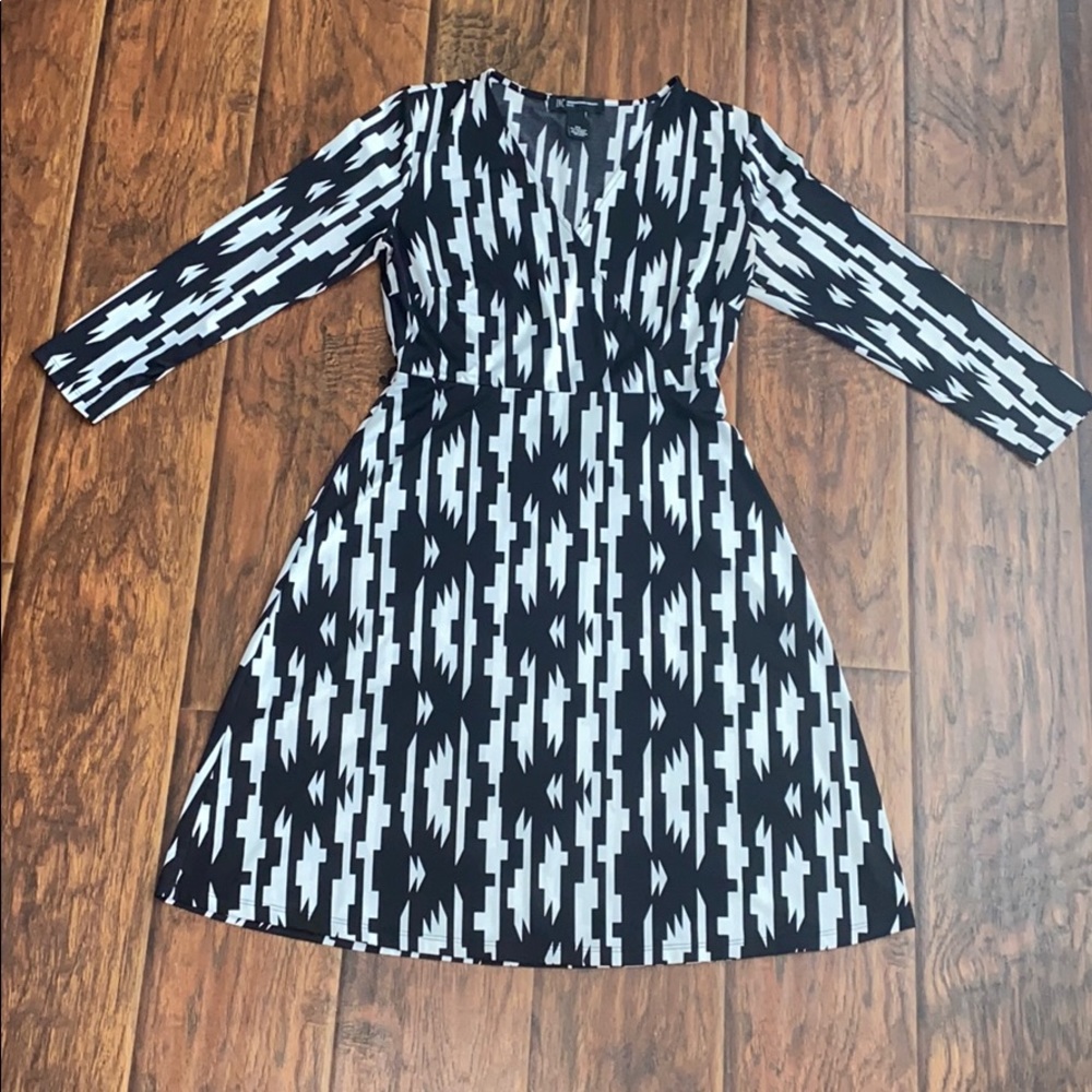 INC black and white long sleeve cross body dress.